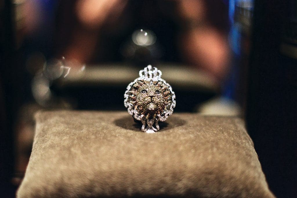 Lion ring by Lydia Courteille in 18K gold with black and
white diamonds, yellow sapphires and citrines, $77,000.