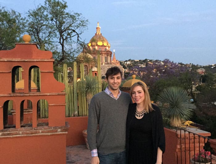 Trey and Amelia Tomjanovich on a rooftop overlooking the city of San Miguel de Allende.