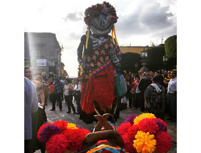 Giant dancing puppets (called mojigangas), an essential part of celebrations in San Miguel.