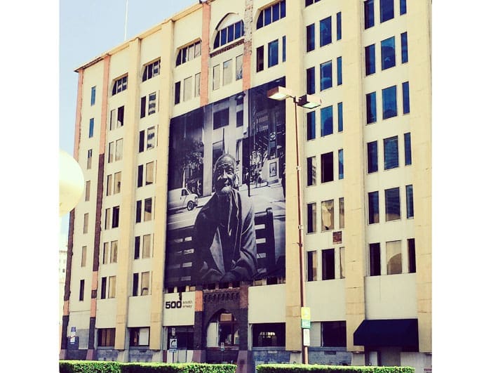 The vintage facade of 500 South Ervay was home to Sharum's portrait "Ronnie," 2014. (Through May 31, the building bears "Homeless Woman," 2014.)  