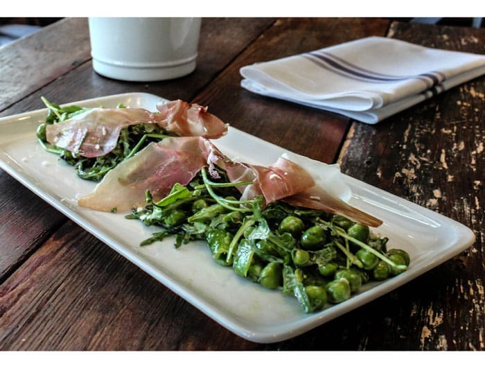 Peas and prosciutto salad with arugula at Coltivare Pizza & Garden