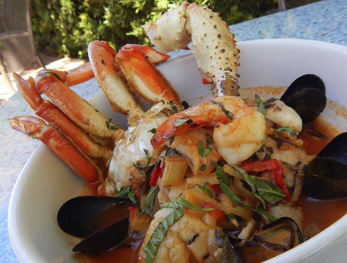 Cioppino at Tony Mandola's. Dungeness crab, mussels, shrimp, fish, scallops, peppers, and potatoes
in a rich broth. 