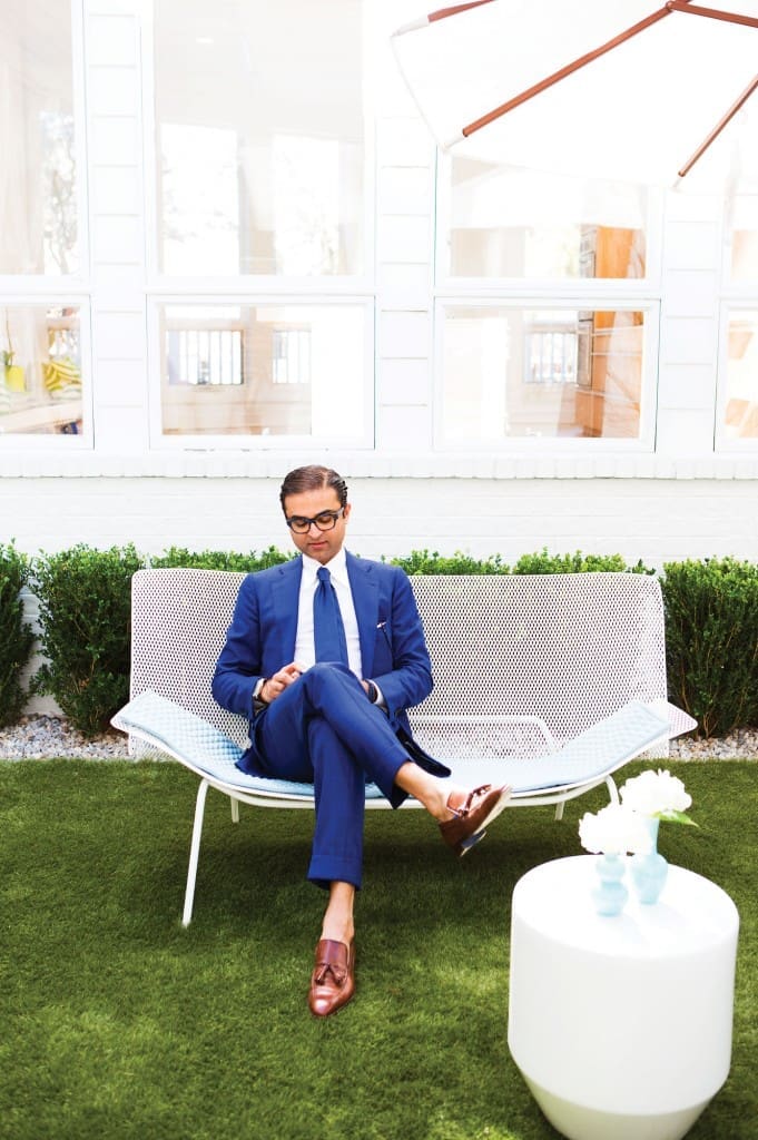 Ed, dressed in a bespoke suit and loafers by Hadleigh’s. Mecox table. Bench from Ligne Roset.