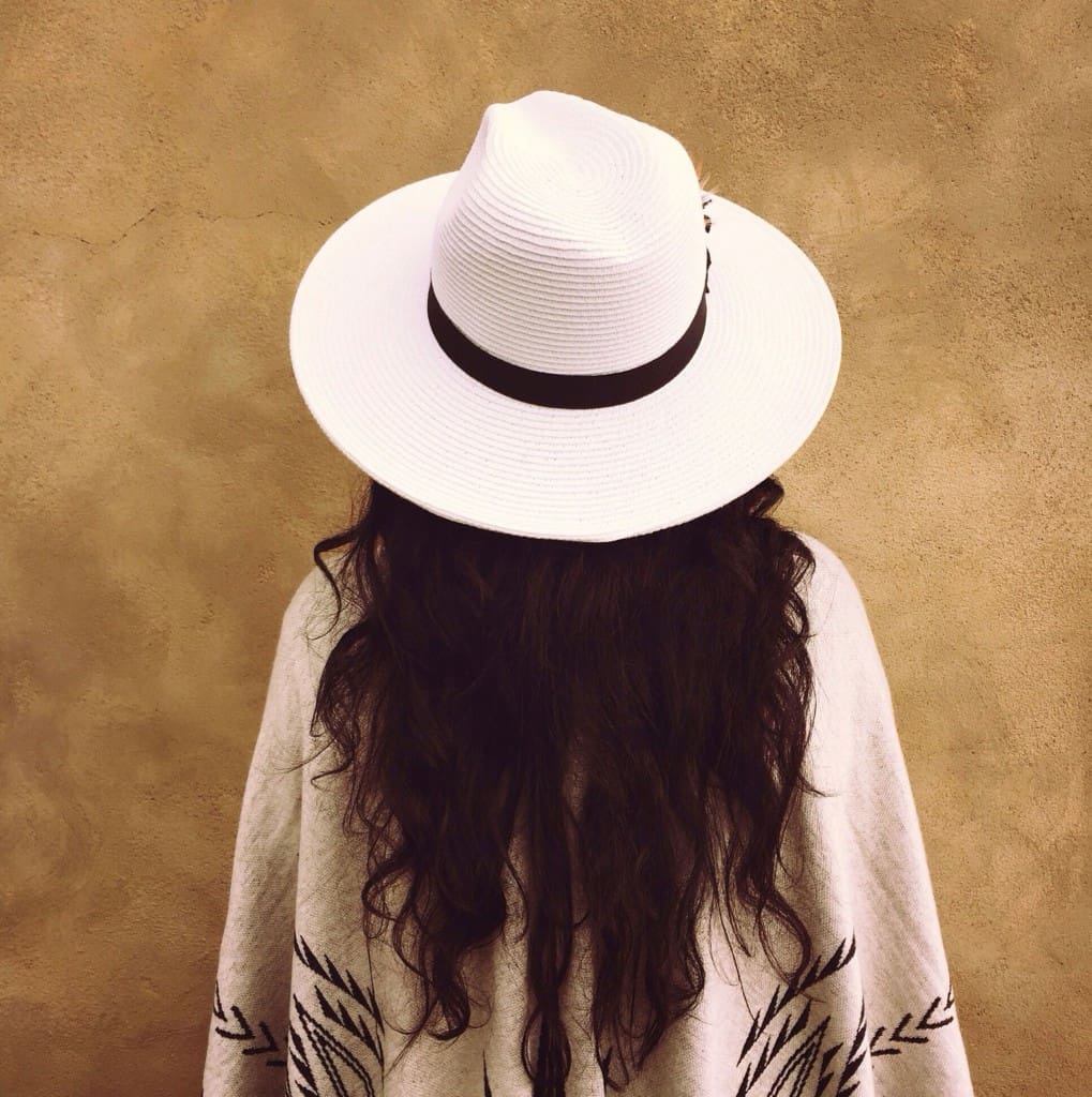 Desert essentials: a hat and a lightweight poncho