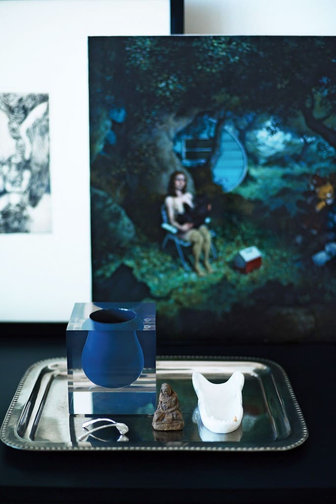 A painting by Erik Thor Sandberg,
Ferment, 2010, acquired by Dailey at TWO x TWO for AIDS and Art. Vase suspended in acrylic was a gift from Jonathan Adler.