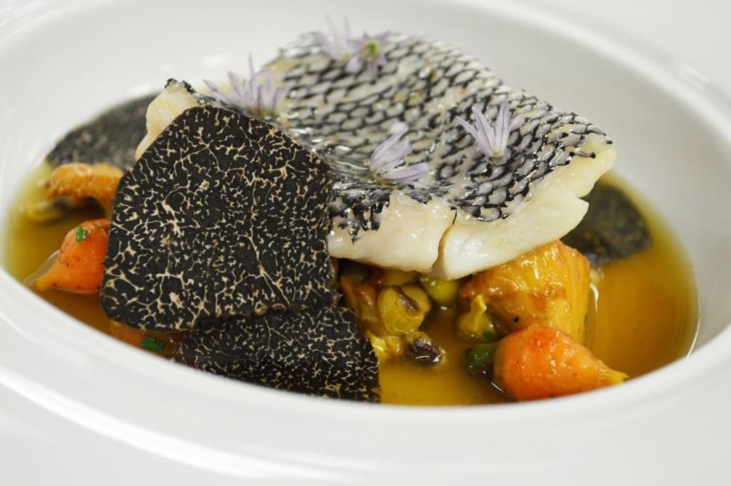 Black bass with chanterelle, Australian truffle and chive blossom