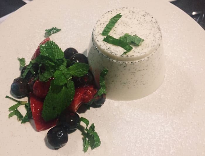 The Pannacotta alla Frutta serves as the dessert for Arcodoro's vegetarian menu. It is a traditional custard finished with raspberries and Saba. 