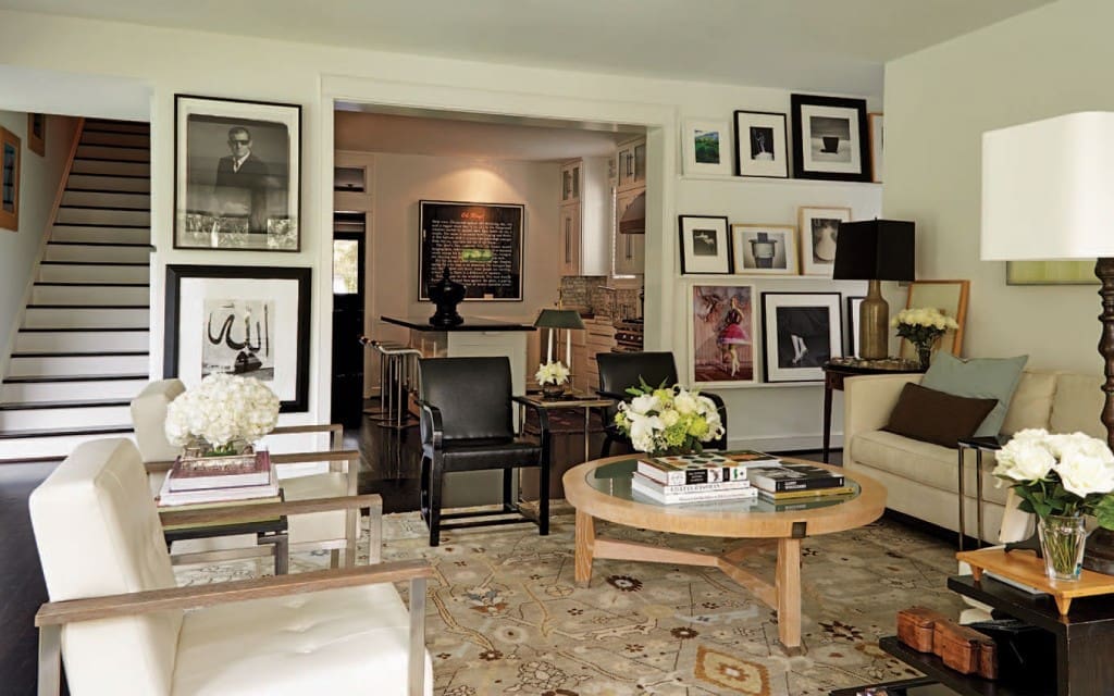 The TV room incudes a coffee table designed by Smith’s friend of 30 years, Vicente Wolf, and rug from Creative Flooring Resources. Of the many works of art on the walls is a photo by Robert Mapplethorpe and a portrait of Smith by Timothy Greenfield-Sanders (far left).