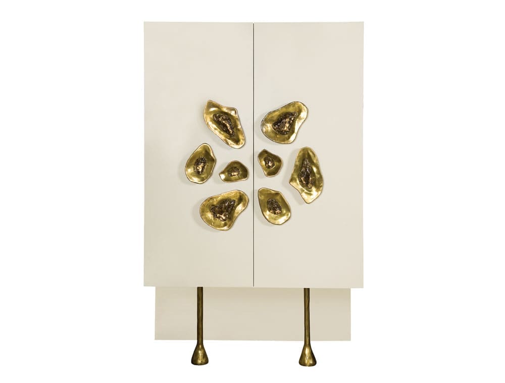 Crescent cabinet in
lacquered wood with walnut interior and burnished brass pulls