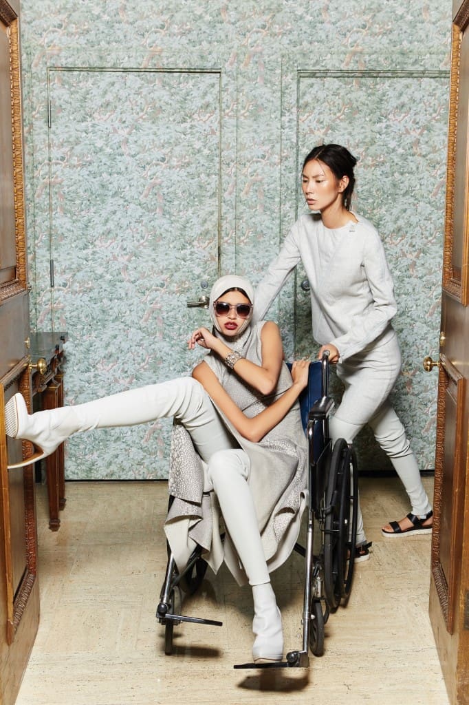 Mrs. Johnson only visits three times a year but always leaves looking just a trifle younger than before. And she never travels without her lady nurse. Mrs. Johnson wears: Akris double-face wool pagoda dress $3,990, overknee
boot $1,990. And her nurse: Akris double-face cashmere multi-zip jacket $4,490, and pencil skirt $1,990. Jayshree Dalal bracelet $21,000.