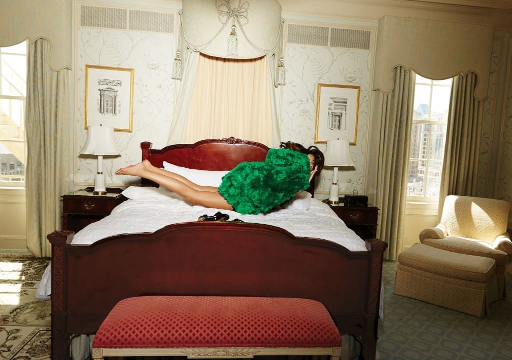 Mrs. Delahue — or shall I say the ex Mrs. Delahue
— in her chambers. Obviously the settlement came through. Versace alpaca fur coat, price upon request, Greek platform sandal $1,474. Agent Provocateur Maxene dress $590.