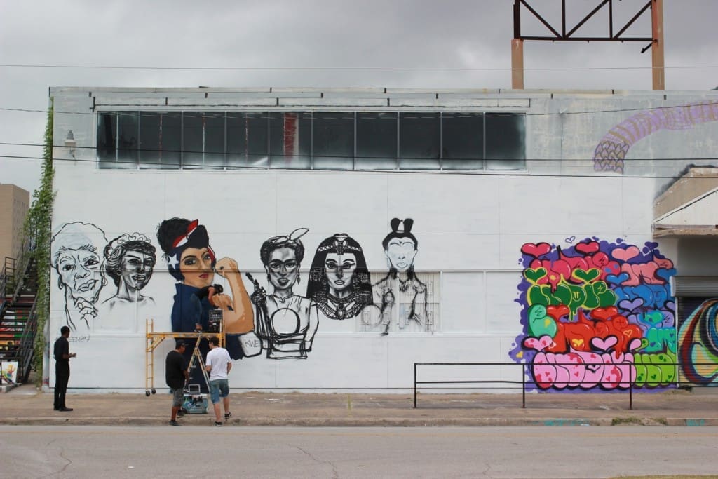At left is Kween897's mural. To the right is New York's Indie184's colorful mural. (1513 St. Emanuel)