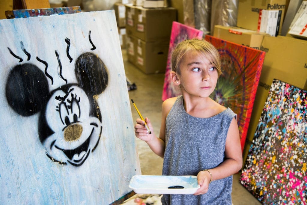 Gia Woodrum with one of her whimsical works.