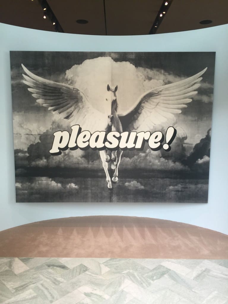 Original art by local artist, Max Snow hangs in the entryway