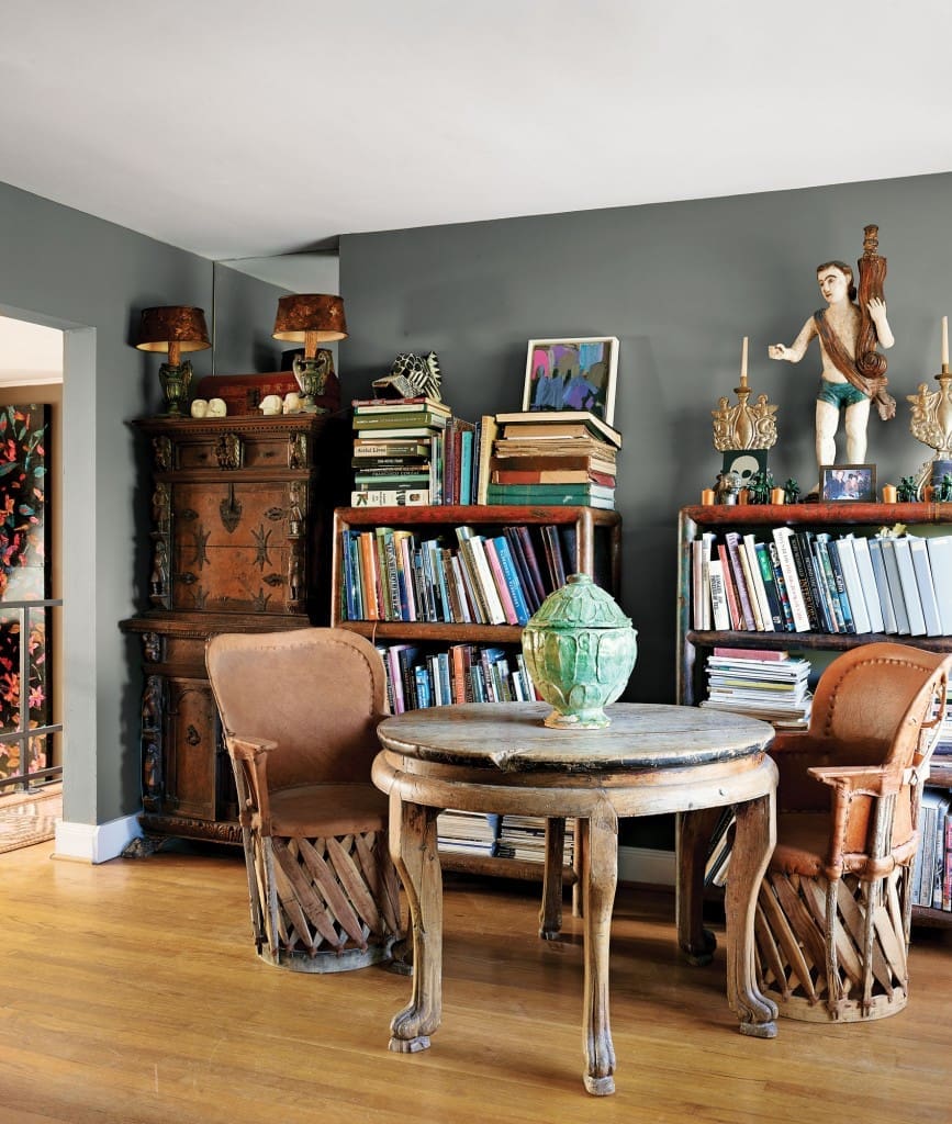 In the upstairs sitting area, Mexican Equipale chairs
and Chinese Ming table from Balinskas Imports. Nineteenth-century Indian
bookshelves and 17th-century Italian chest on chest.