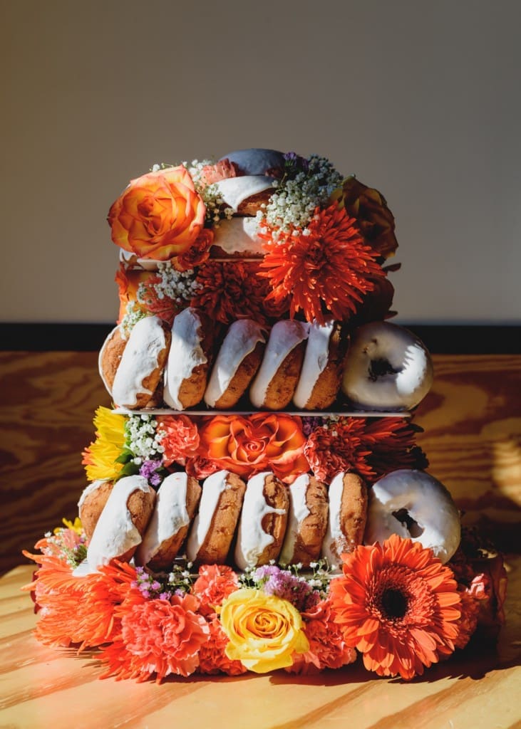 If you're not a fan of wedding cake, opt for a tiered donut cake like this one from Hugs & Donuts. 