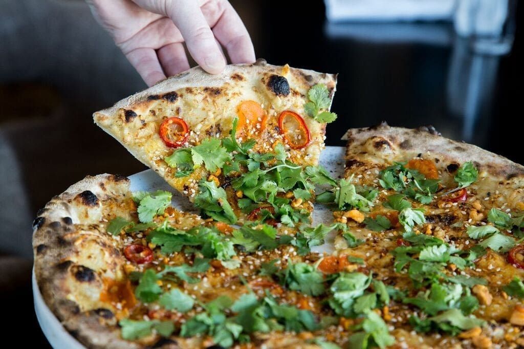 Enjoy W+M's signature carrot pizza for $10. 