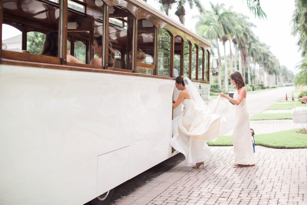 Going to the Chapel: A trolley proved a whimsical way to get the bride and her attendants to the ceremony.