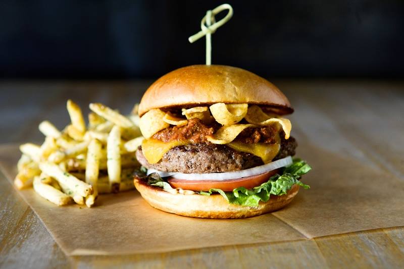 Hopdoddy's Terlingua burger is slathered in corn Fritos and the eatery's Sassy sauce. 