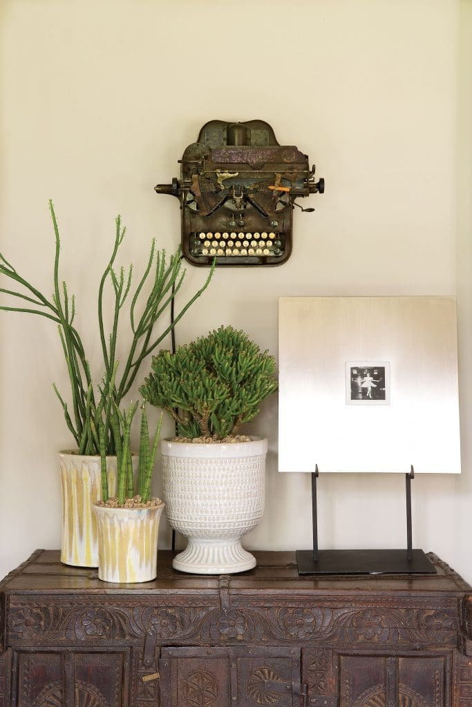 Vintage typewriter acts as unexpected art when fashioned to the wall.