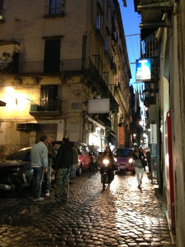 Vibrant Spaccanapoli at night.