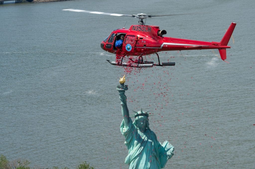 French Touch Events' most moving creation happened June 6, 2014, when it dropped one million rose petals over the Statue of Liberty on the 70th anniversary of D-Day. (Courtesy French Touch Events)