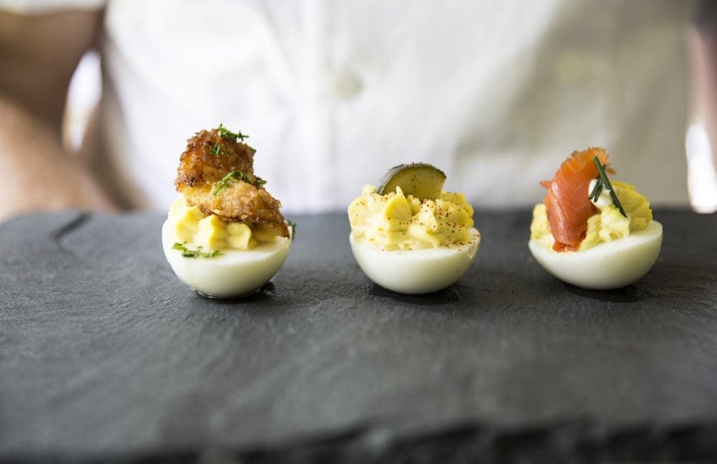 Start your meal with a trio of deviled eggs. 