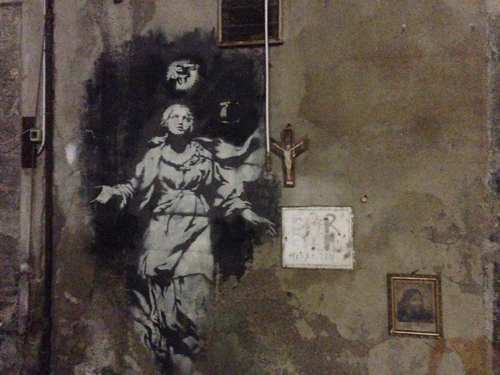 Napoli's Banksy on Spaccanoapoli, as it appeared in 2013.