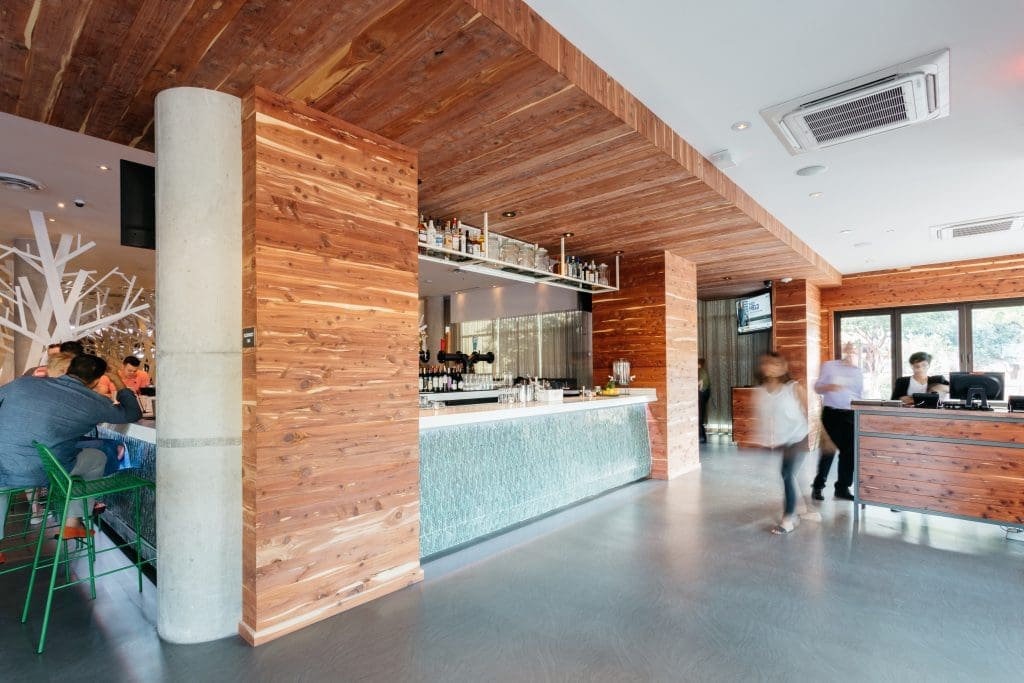 Cedar wood takes over the restaurant's entrance. 