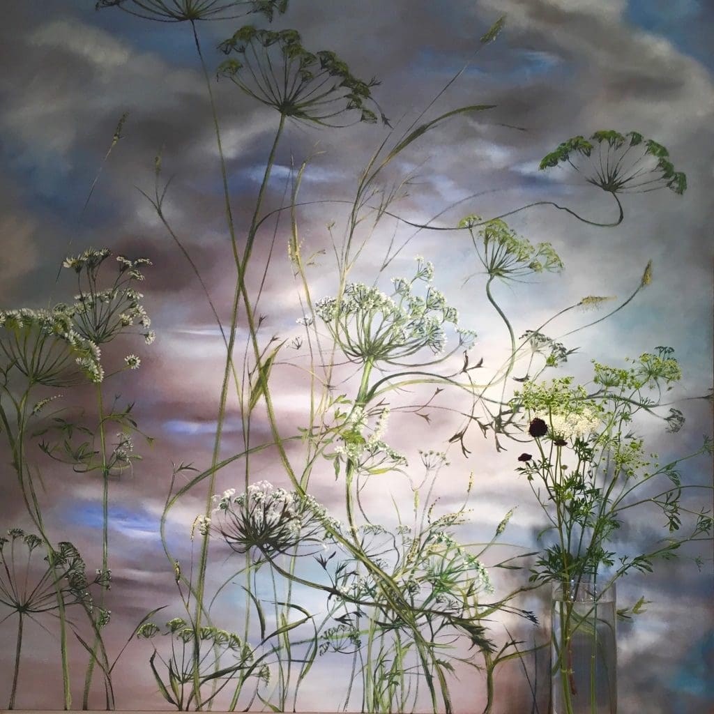 Live umbels with a painted sky canvas reveal the artist's gift with the language of Mother Nature.