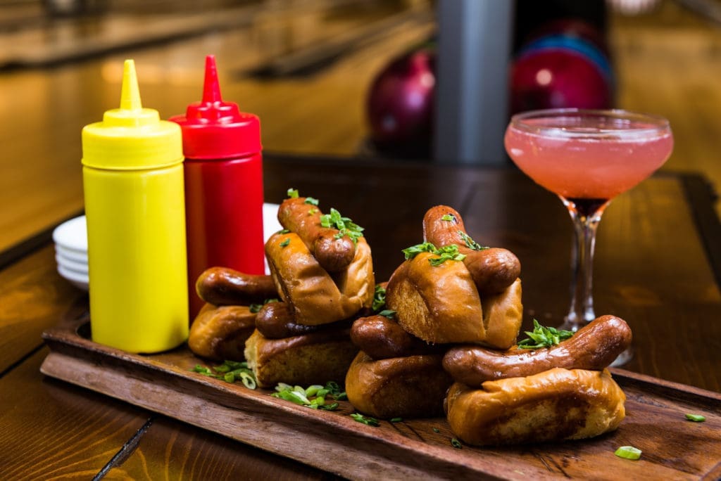 Bowl & Barrel's Dog Pile features six miniature hotdogs served with ketchup and mustard. 