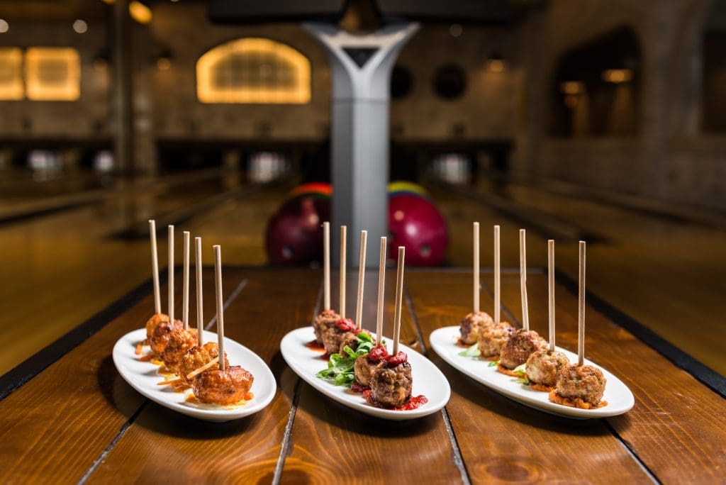 A trio of meatballs — meatloaf, pork and beans, and buffalo chicken. 