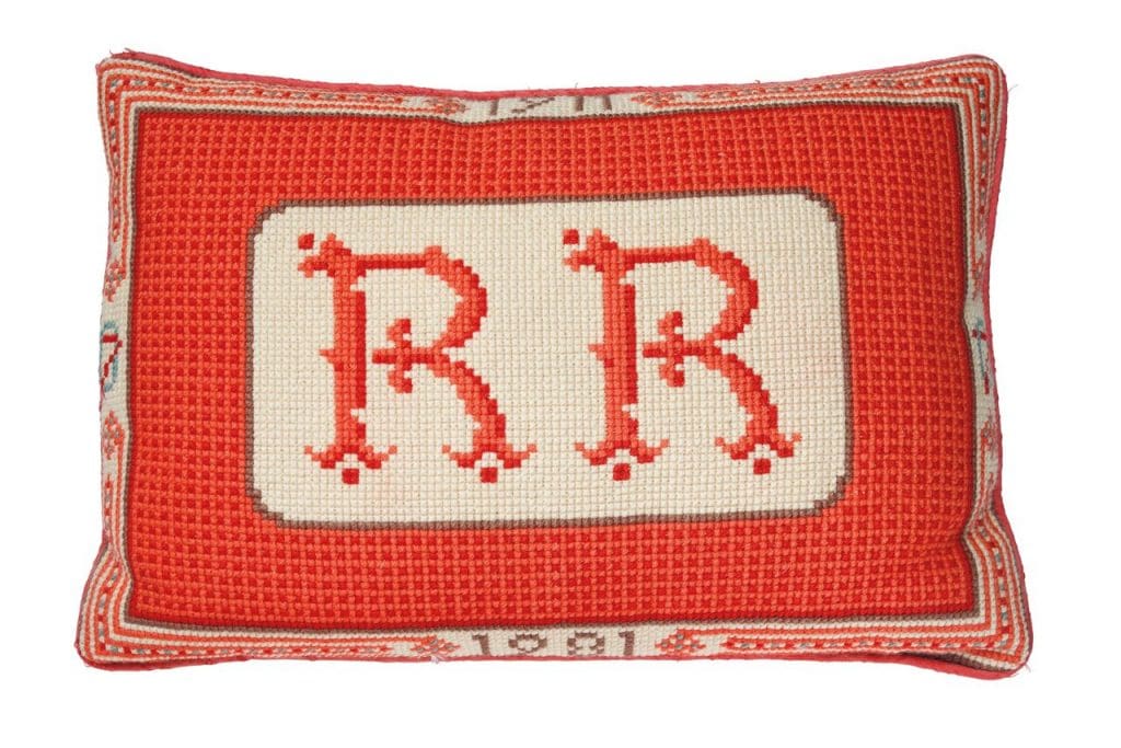 President Reagan's 70th birthday present, a red monogrammed needlepoint cushion, 1981