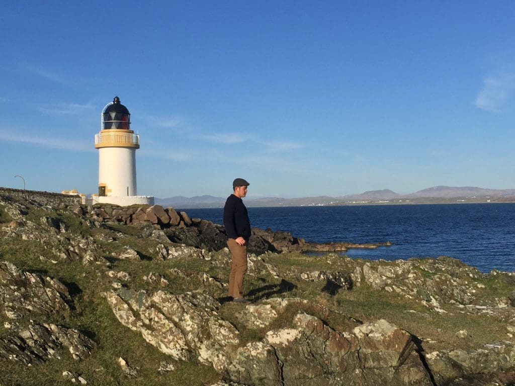 Jessey Qi in front of a lighthouse in Port Charlotte, Isle of Islay. (Photo by Bobby Heugel)