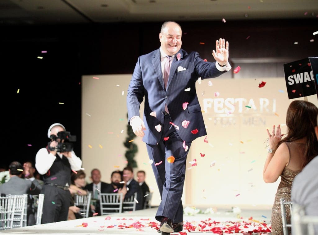 Houston’s Sports Hunks and Business Tycoons Strut Down the Runway as a Wild Crowd Approves