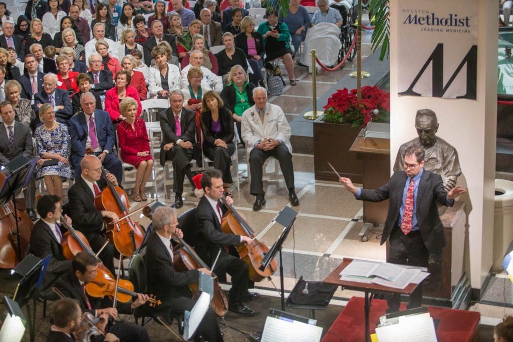 440_HM_PlatinumConcert2016.JPG_Houston Methodist Platinum Program Holiday Celebration featuring the Houston Symphony Holiday Concert in the Crain garden December 13, 2016. (Photo by Richard Carson)

***DOWNLOAD INSTRUCTIONS***
Download full resolution individual photos by clicking the "down" arrow below the preview images on the right hand side of the page. You can download all the images by clicking "download all" above the preview. 

This cloud based gallery will be available for three months in order to enable you to download all of the photos to your computer for safe long term storage. While the gallery may be in the cloud for longer than this time you should endeavor to file and secure the photos for future use in whatever manner you deem appropriate.