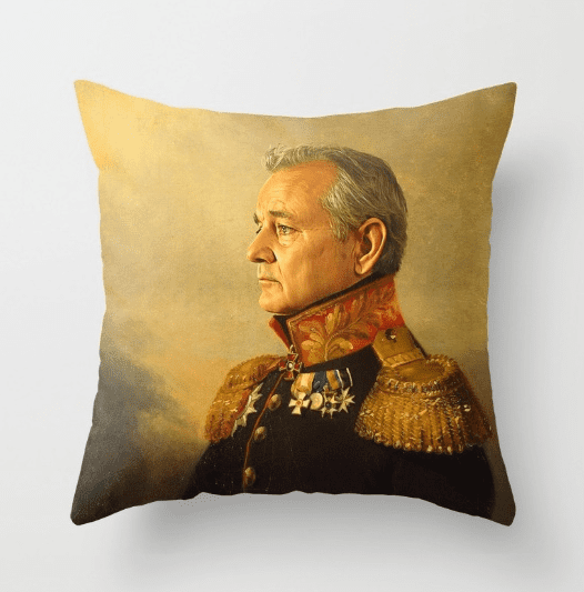 Snuggle up with Bill Murray with this festive throw pillow. He likes movies too...$17, <a href="https://society6.com/product/bill-murray-replaceface_pillow#s6-829867p26a18v126a25v193">Society6.</a>
