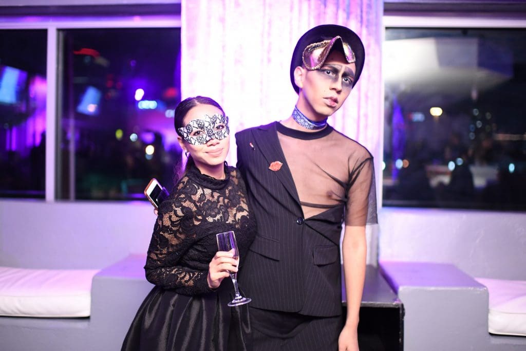 Masked partygoers