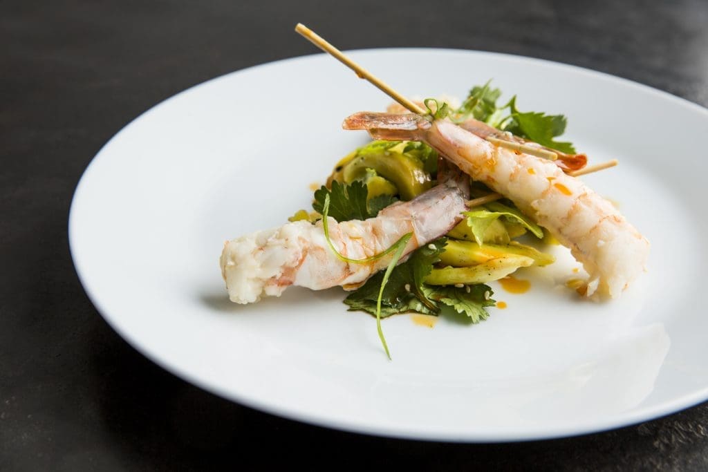 Grab the Gulf Coast shrimp skewers at Local's raw bar. 