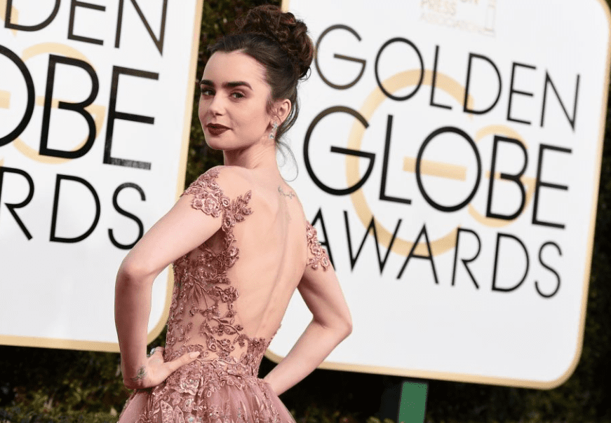 Lily Collins brings fairytale to the red carpet in Zuhair Murad. 