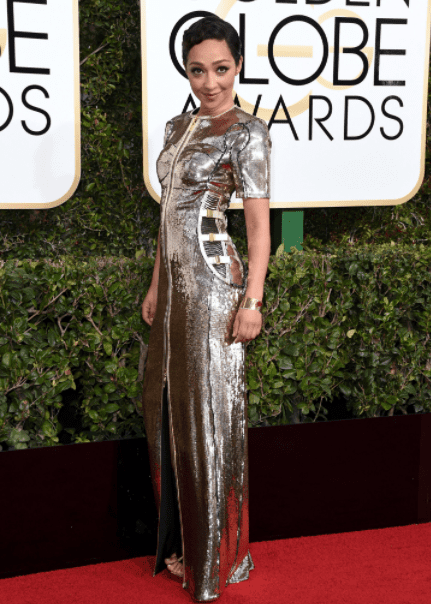 We are "Loving" actress Ruth Negga's Louis Vuitton dazzling silver molten metal gown.
