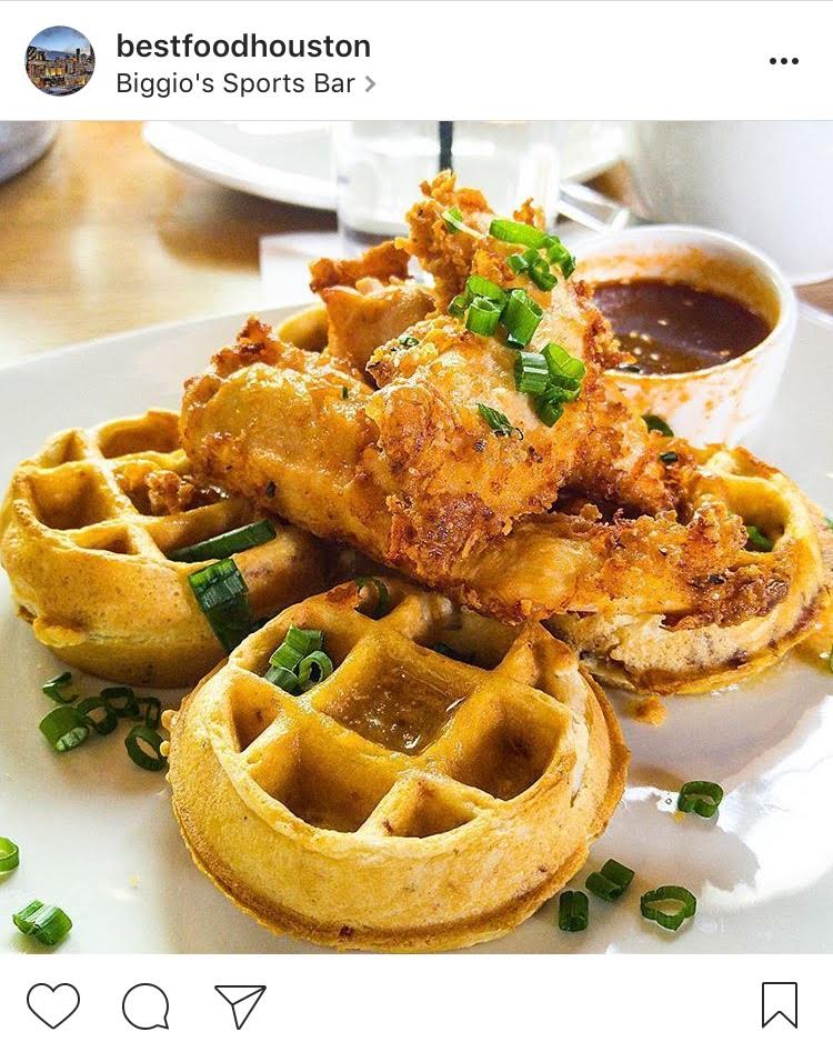 Crispy friend chicken on top of four mini waffles drenched in syrup from Biggio's Sports Bar