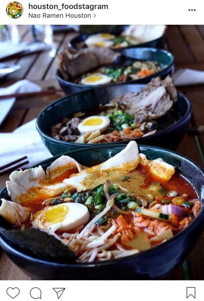 Shoyu Beef and Chicken Ramen with pickled vegetables, bamboo shoots, and an egg from Nao Ramen
