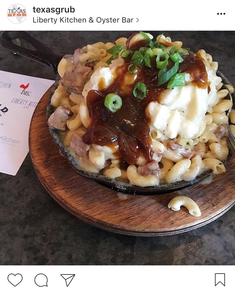 Brisket Mac n Cheese topped with with mashed potatoes, barbecue sauce, and chives from Liberty Kitchen & Oyster Bar