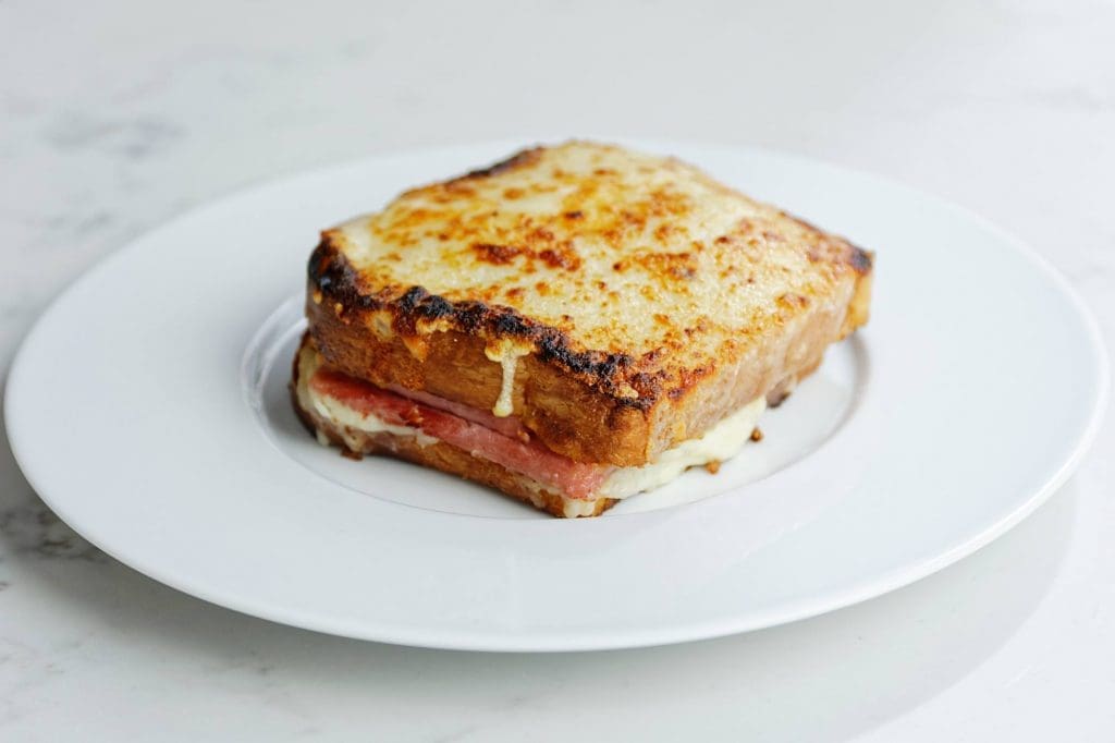 Pair your Croque Monsieur with salad or pommes frites. 