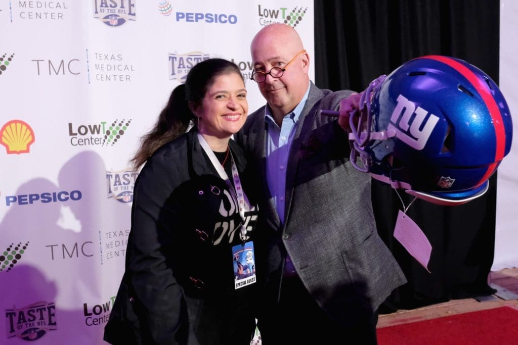 HOUSTON, TX - FEBRUARY 04:  TNFL Celebrity Chef Hosts Alex Guarnaschelli (L) and Andrew Zimmern  attend the Taste Of The NFL 'Party With A Purpose' at Houston University on February 4, 2017 in Houston. at University of Houston on February 4, 2017 in Houston, Texas.  (Photo by Nicholas Hunt/Getty Images for Taste Of The NFL)
