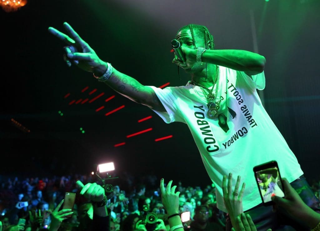 Travis Scott will perform with Lil Wayne on Halloween at Warehouse Live. He's rooting for the Astros.