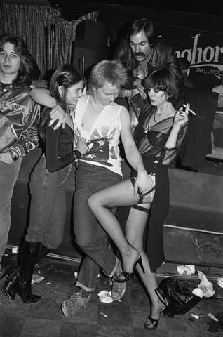 Paul Cook of The Sex Pistols misbehaves in 1978 at the Longhorn. (Photo © Lynn Goldsmith/Corbis)