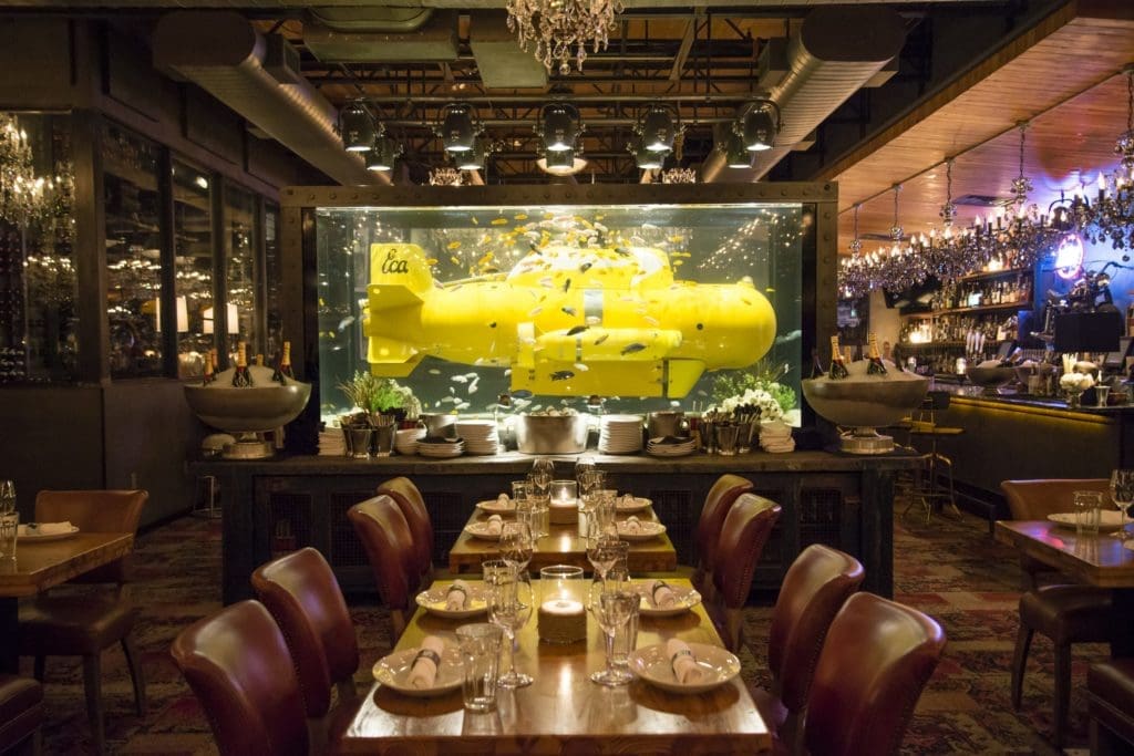A yellow submarine in the middle of Town Hearth's dining room.