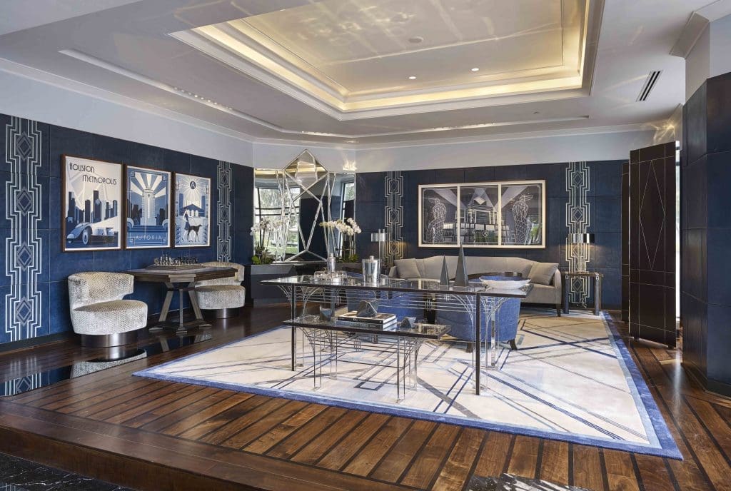 The lobby with blue leather paneled-walls with embroidery stitched by the same artisans that stitch Louboutin shoes. 